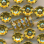 Strass-Rondelle kristall goldfarben, Inhalt 10 St&uuml;ck, Gr&ouml;&szlig;e 10 mm, gefasst, Spacer*